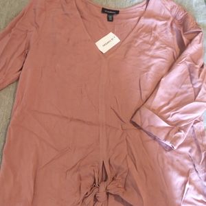 Beautiful light tie bottom blouse